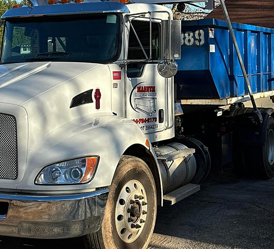 mangum dumpster truck